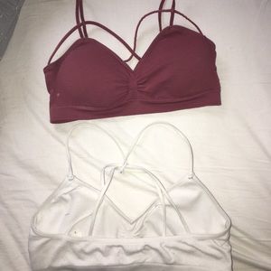 Two strappy bras